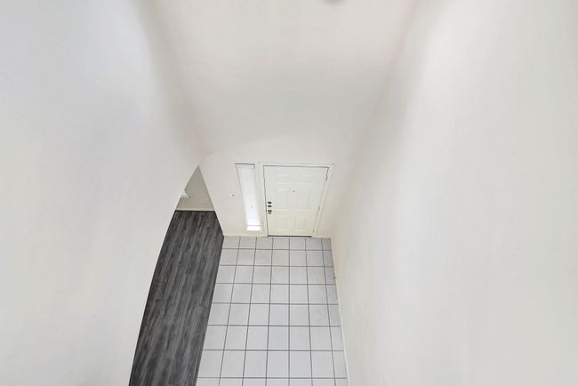 View from upstairs overlooking the entryway. | Image 22