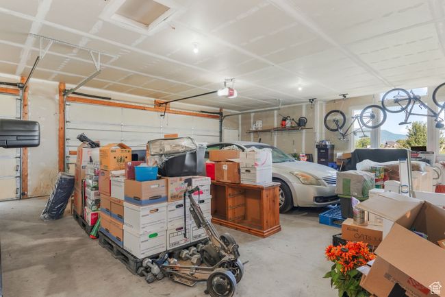 Garage featuring a garage door opener | Image 27