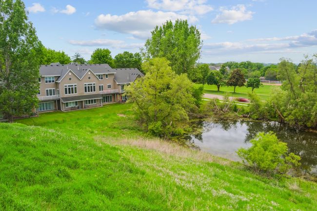 An unbeatable location—directly across from prestigious Shattuck-St. Mary’s School and backing to Legacy Golf Course! | Image 5