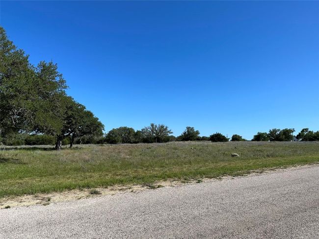 View of asphalt road with a view of countryside | Image 15