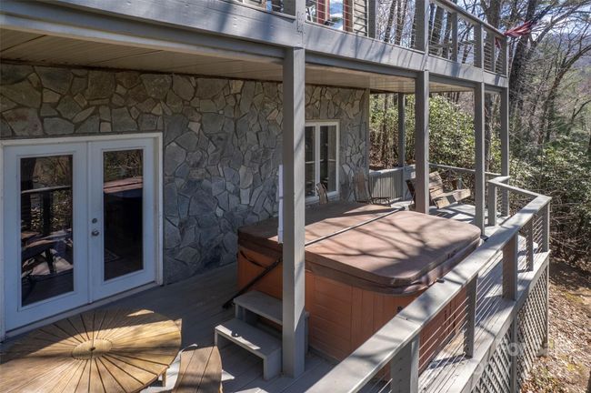 Basement deck with hot tub | Image 16