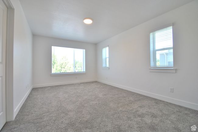 Main Bedroom featuring carpet floors and baseboards | Image 8