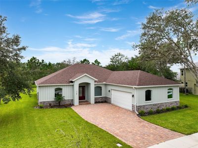 7169 Oak Glen Trl, House other with 4 bedrooms, 3 bathrooms and null parking in Harmony FL | Image 1