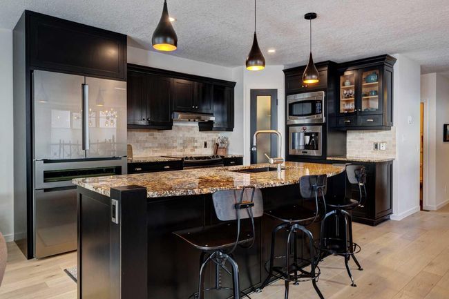 B - 116 Otter, Home with 5 bedrooms, 4 bathrooms and 3 parking in Banff AB | Image 5