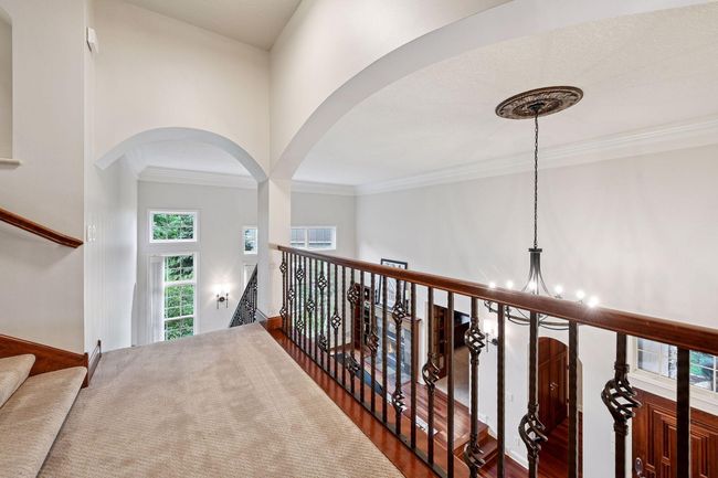 Primary suite with bedrooms down the hall | Image 31