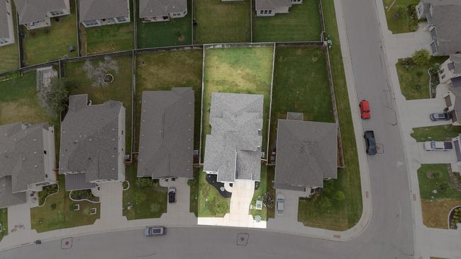 Aerial view oh home showing large backyard | Image 36