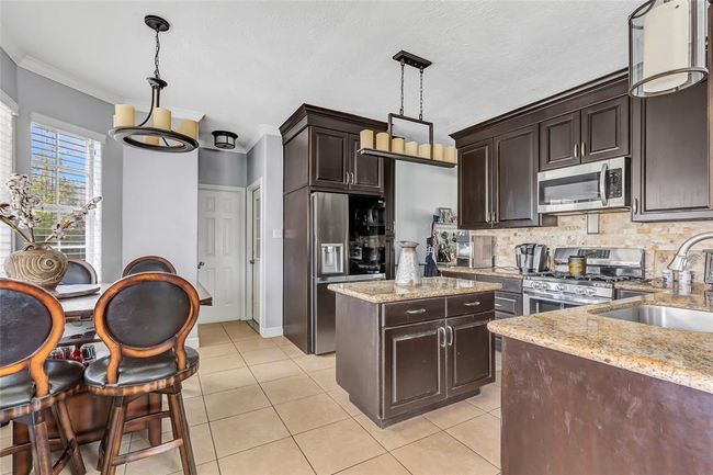 Remodeled kitchen with CUSTOM cabinets | Image 24