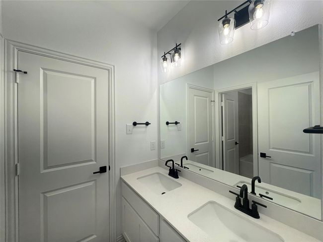 Full bath featuring double vanity | Image 21