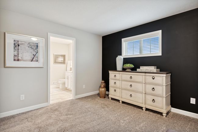 By having the walk in closet accessible from the bathroom, it leaves the room with more space for furniture placement. *Photos are of a model home, some features and colors may vary. | Image 18