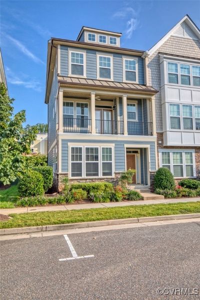 View of property with a balcony | Image 1