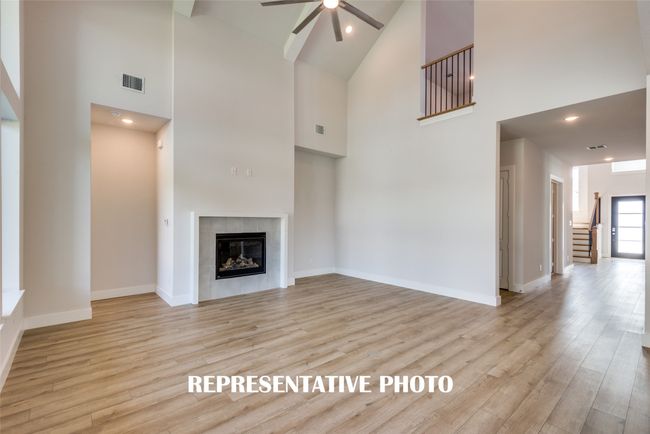 Featuring beautiful flooring, high ceilings and an overlook from the game room, the entire family will love everything this family has to offer! REPRESENTATIVE PHOTO. | Image 10