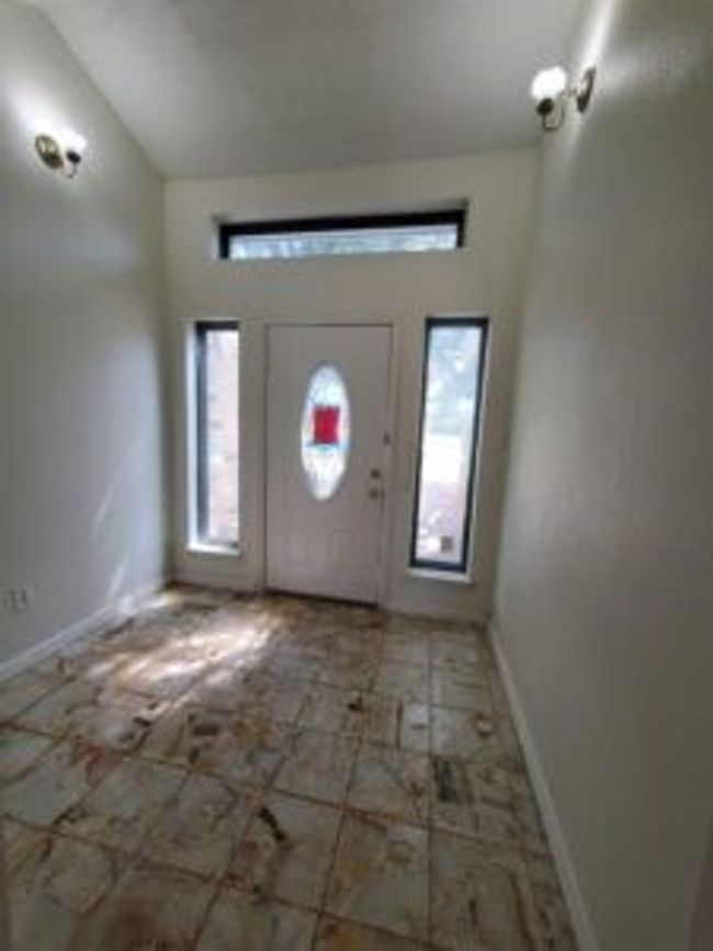 Foyer with plenty of natural light and high vaulted ceiling | Image 5