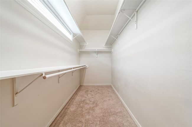Walk in closet located in primary bath | Image 21