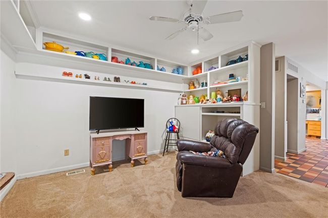 Living room featuring carpet floors, a ceiling fan, and recessed lighting | Image 16