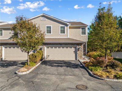 View of front property featuring a garage | Image 1