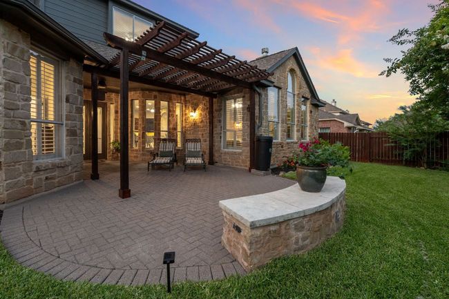 Patio terrace at dusk with a pergola and a patio | Image 27