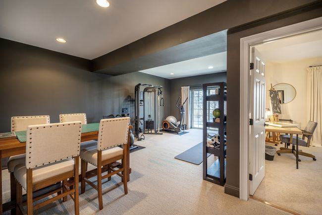 Lower level with additional bedroom, full bathroom and sliders out to the back patio | Image 22