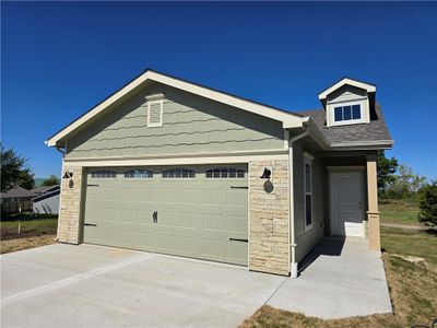 View of front of house featuring a garage | Image 1