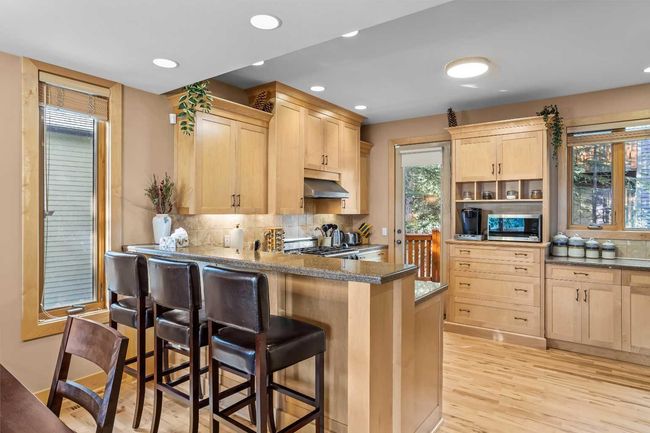 4 - 124 Silvertip Ridge, Home with 4 bedrooms, 3 bathrooms and 4 parking in Canmore AB | Image 9
