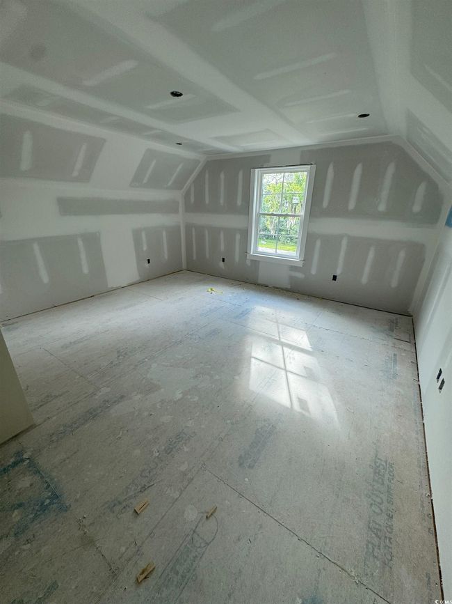 Bonus room featuring vaulted ceiling | Image 34