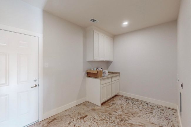 Washroom with baseboards, visible vents, and recessed lighting | Image 39
