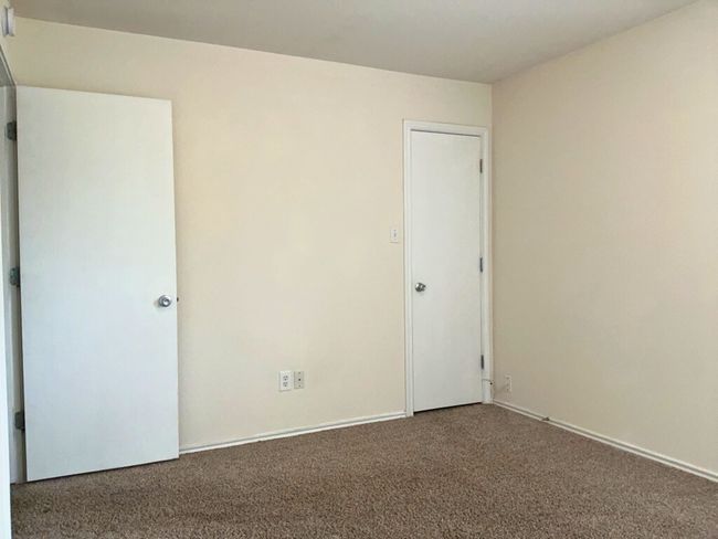 Bedroom featuring carpet floors and baseboards | Image 16