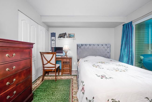 Bedroom with baseboards | Image 14