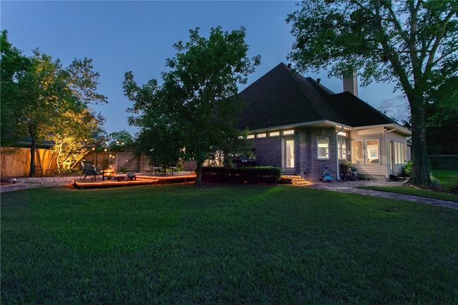 View of yard featuring entry steps and fence | Image 48