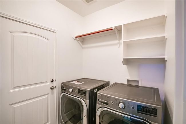 Laundry area featuring washer and dryer | Image 30