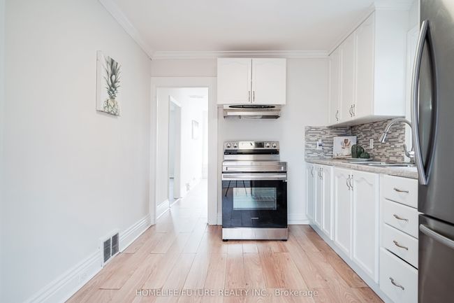 42 Ritson Rd S, Home with 4 bedrooms, 2 bathrooms and 8 parking in Oshawa ON | Image 6