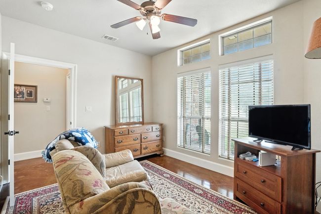 Sitting room with baseboards and a ceiling fan | Image 27