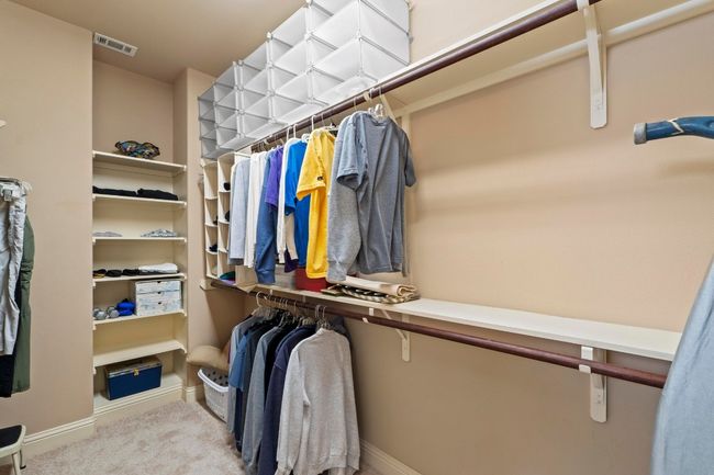 Tons of storage in this primary closet. | Image 31