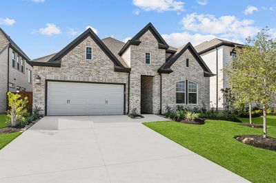 Welcome to The Danbridge by David Weekley Homes. Move-In Ready Now! | Image 1