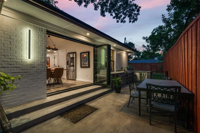 View of patio featuring outdoor dining area | Image 33