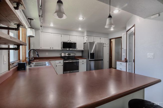 1255 Chukar Cir, House other with 4 bedrooms, 2 bathrooms and 2 parking in Mountain Home ID | Image 9