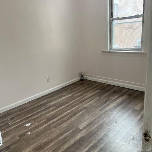 18814 Woodhull Avenue, New York, NY, 11423 | Card Image