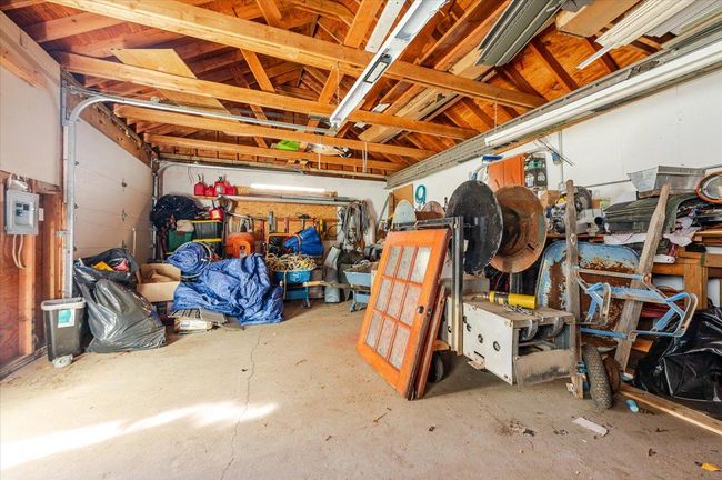 Garage featuring electric panel | Image 23