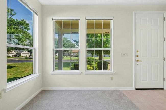 Entrance foyer with plenty of natural light and baseboards | Image 6