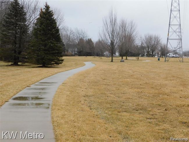 Walking trail leading to park across street from backyard | Image 26