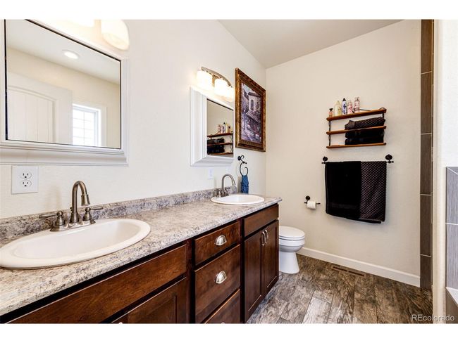 59466 E Commanche Way, House other with 3 bedrooms, 3 bathrooms and null parking in Strasburg CO | Image 17