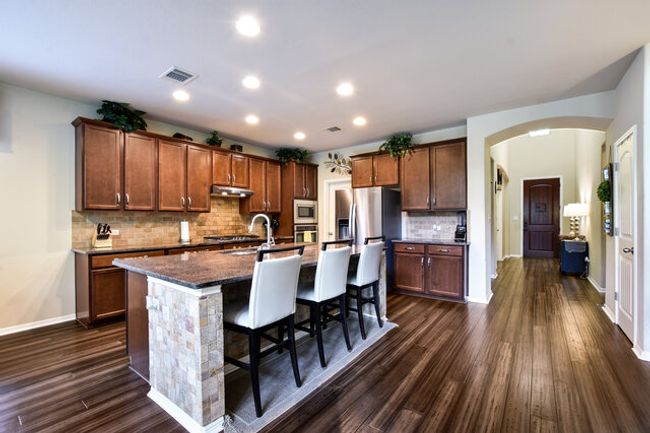 Gourmet kitchen and so great for conversation! | Image 9