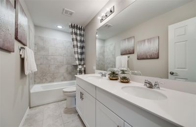 Spacious secondary bathroom *Photos of furnished model. Not actual home. Representative of floor plan. Some options and features may vary | Image 2