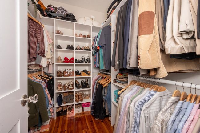 Walk-in Closet with Organized Systems. | Image 24