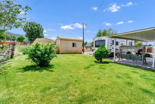 View of yard with a patio | Image 26