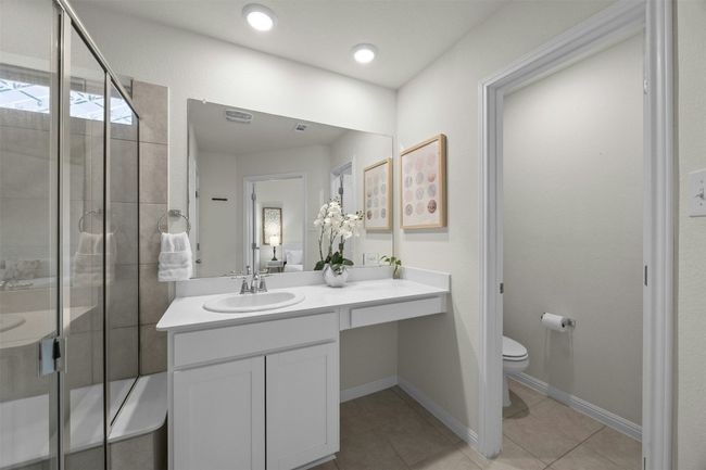 Main bathroom with walk-in shower and linen closet | Image 9