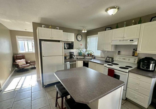 201 - 5220 50 A Avenue, Townhouse with 3 bedrooms, 2 bathrooms and 1 parking in Sylvan Lake AB | Image 13