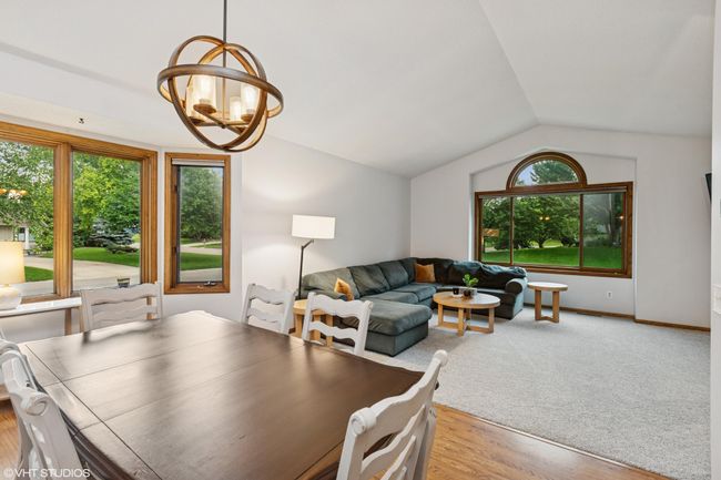 Family room with the formal dining room just steps away for easy entertaining | Image 9