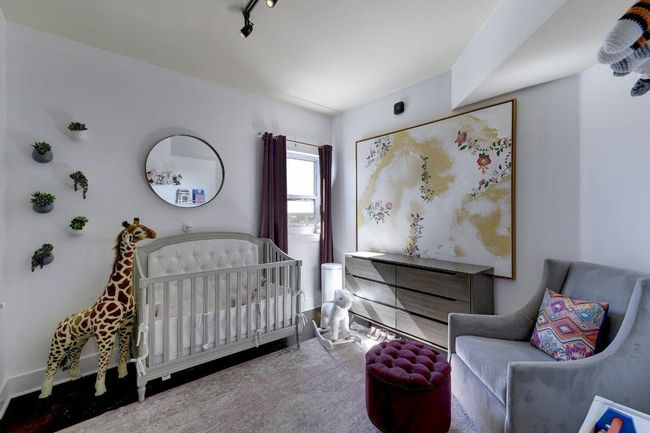 Bedroom featuring a nursery area and baseboards | Image 13