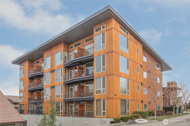 Welcome to your luxurious retreat in Chelan, WA! This fully upgraded condo is the epitome of comfort and style, offering partial views of the lake, stunning mountains, and surrounding territory through oversized floor-to-ceiling windows and doors | Image 33