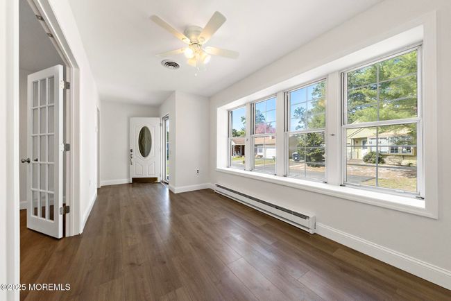 French doors lead to the enclosed porch | Image 22